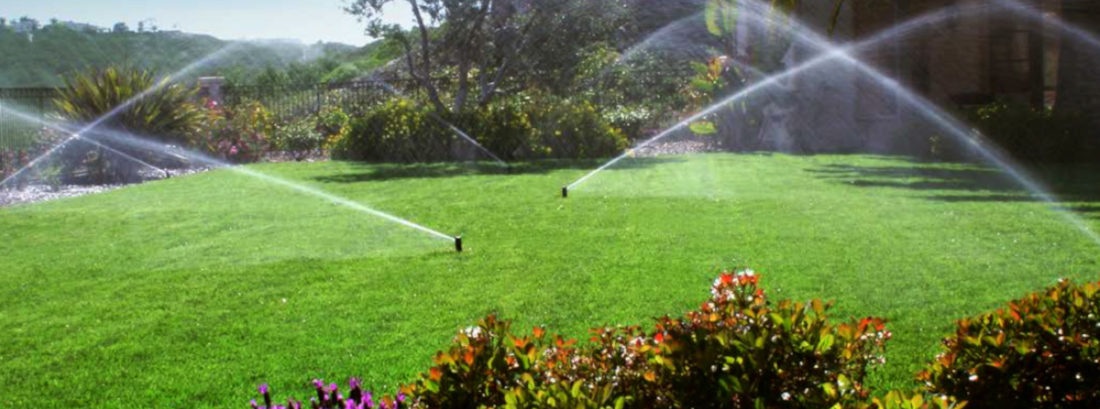 Sprinkler irrigation system watering a lawn