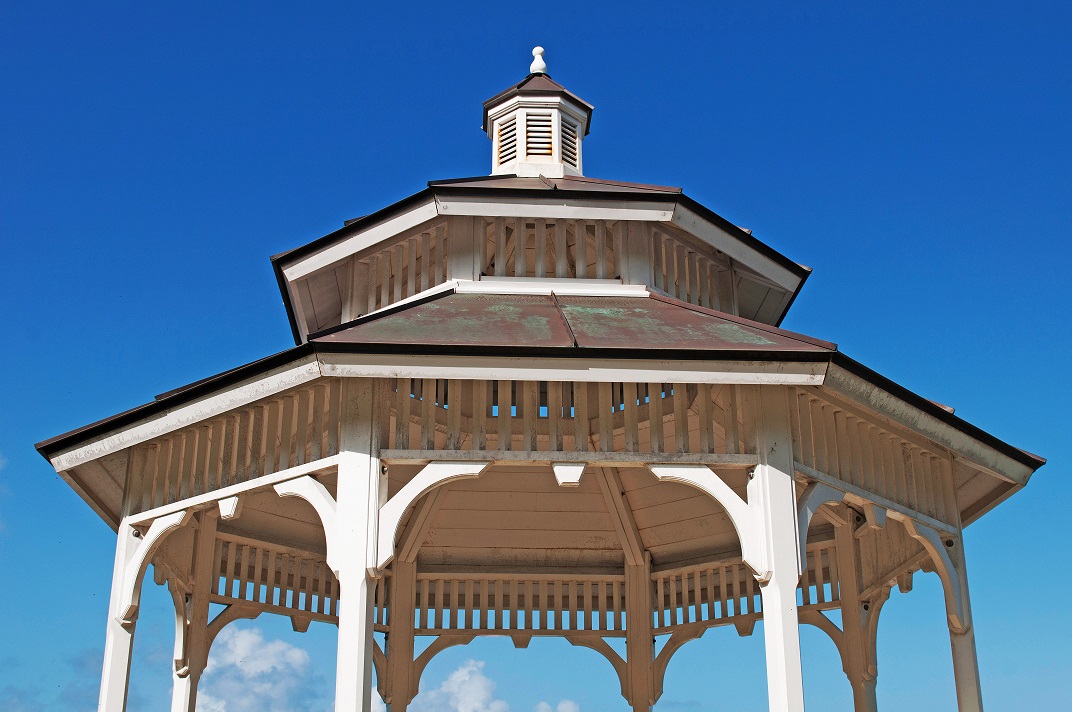 Timber gazebo shading a backyard seating area